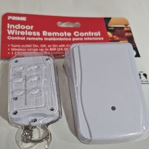 White Indoor Wireless Remote Control/Includes extra battery.